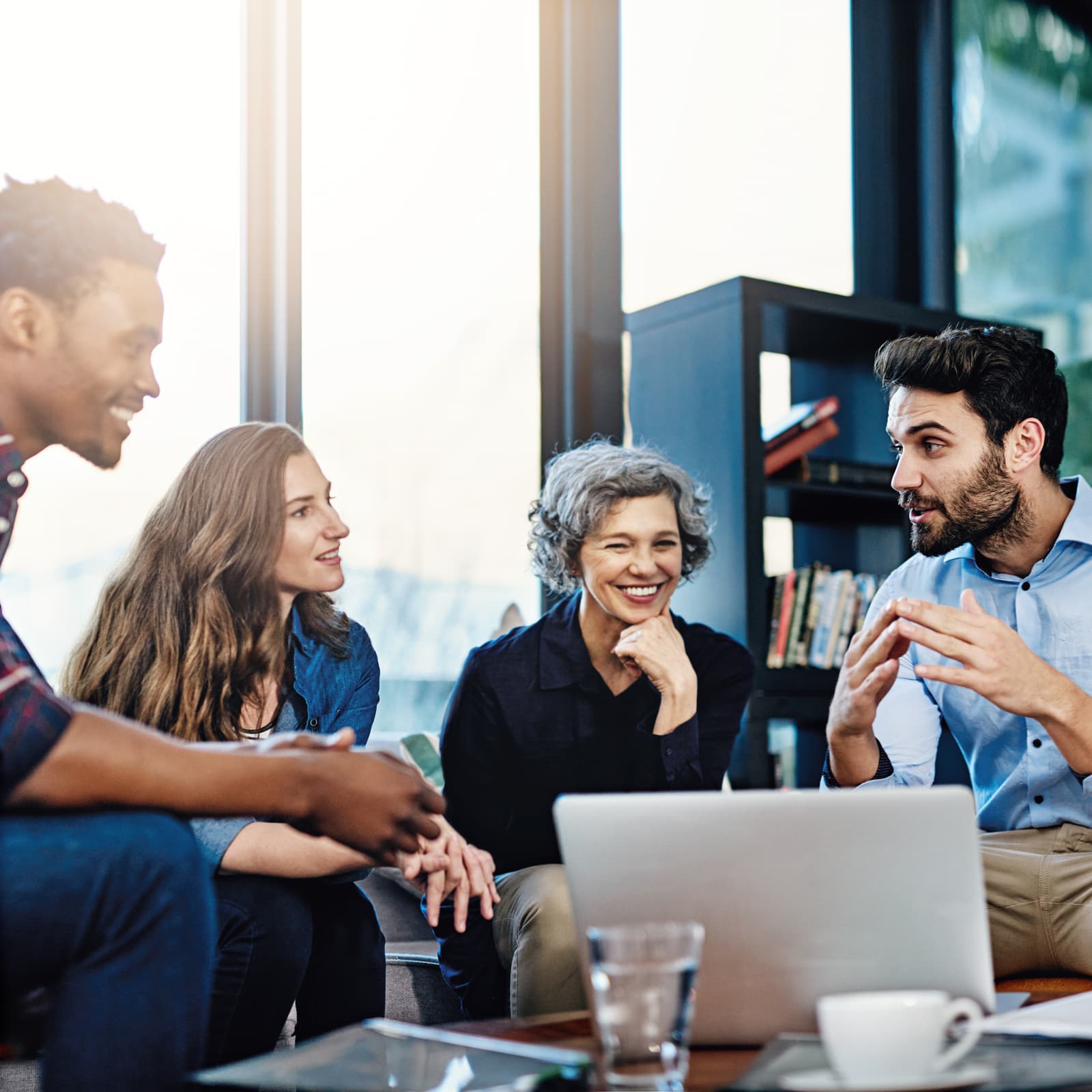 Group of creatives having a meeting in a modern office