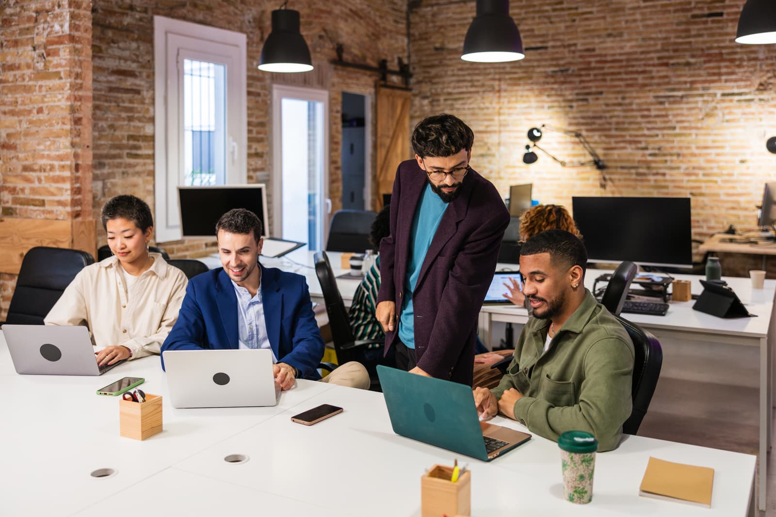 On-Demand Delivery - Professional working on laptop